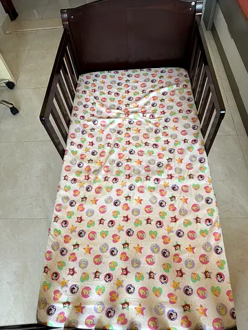 Wooden Crib with Colorful Mattress