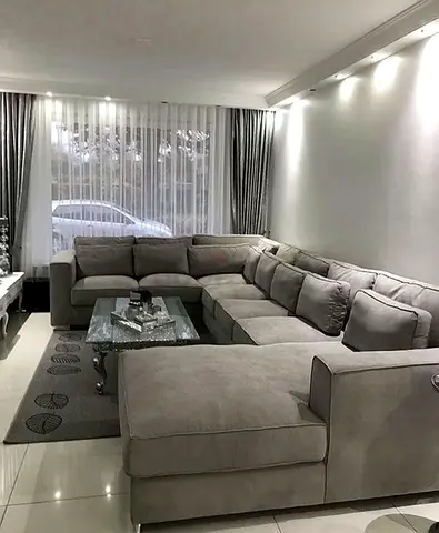Modern and Comfortable L-Shaped Sofa in Grey
