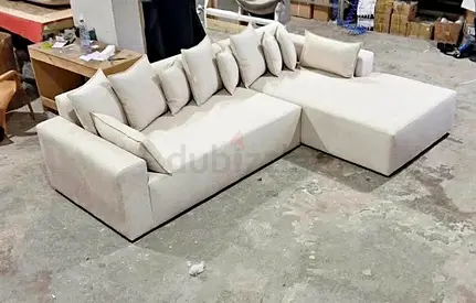 Comfortable L-Shaped Sofa with Cushions