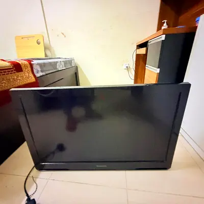 Panasonic TV with TV Stand for sale