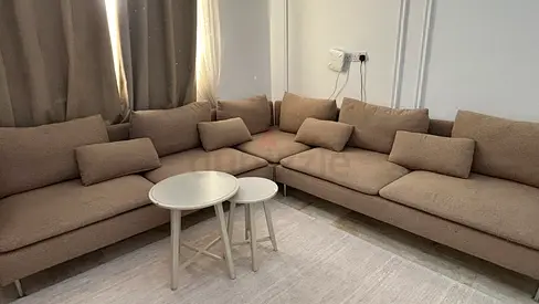Cozy L-Shaped Sofa with Coffee Tables