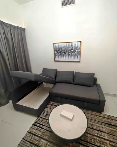 Ikea L Shape Sofa cum bed with big storage in L