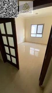 A room and living room with a bathroom and kitchen, directly on Ammar Street. The living room is sep