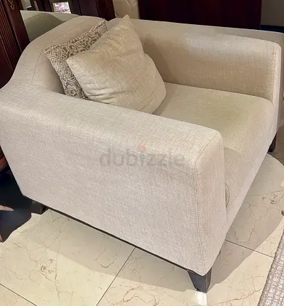 Elegant Cream Armchair with Cushion