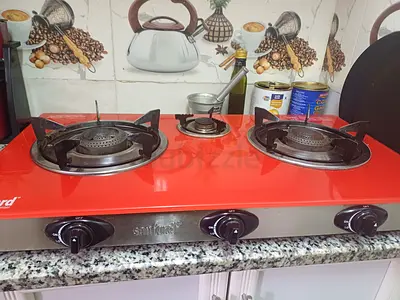 Stylish Red Gas Stove with Three Burners