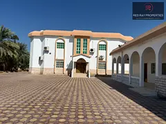 Spacious 11-Bedroom Villa for Rent in Julfar