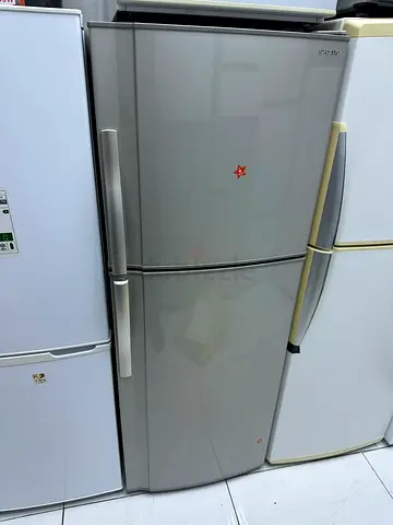 Sharp refrigerator made Japan working is one year warranty also delivery