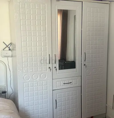 Elegant Three-Door Wardrobe with Mirror