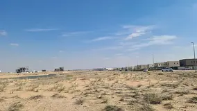 For sale in Rawdat Al Qurt: a commercial/residential plot of land