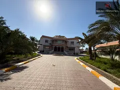Spacious 9-Bedroom Corner Villa for Rent in Julfar