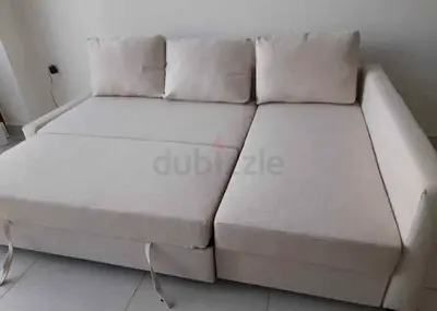 Cozy White Sofa Bed with Cushions