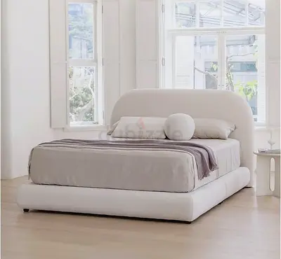 Modern Upholstered Bed with Soft Curves