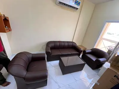 Elegant Brown Leather Sofa Set with Coffee Table