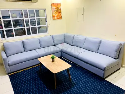 Cozy L-Shaped Sofa with Coffee Table
