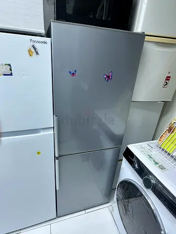 Aqua refrigerator bottom freezer made Japan working is one year warranty