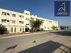 Industrial property for sale in Industrial Area 2, Sharjah. Corner plot on two paved streets with a