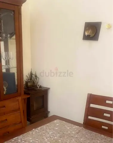 Elegant Wooden Dining Set with Display Cabinet