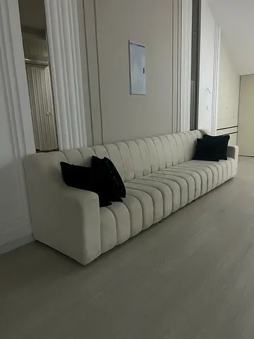 Modern Cream Sofa with Black Accent Pillows