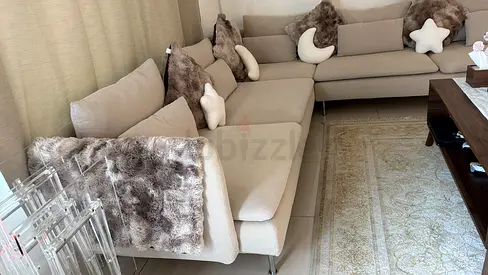 Cozy L-Shaped Sofa with Decorative Cushions