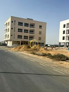 For sale: residential and commercial land in Sharjah, Al-Tilal City area, Al-Seyoum suburb, with an
