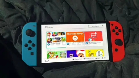 Nintendo Switch (OLED Model) - Neon Red and Blue (UAE Version)