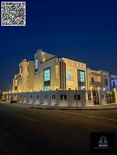 A luxurious corner villa on two streets, featuring a modern design, high-end finishes, and a garden,
