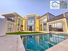 A luxurious villa in one of Ajman's most prestigious areas, featuring a private pool, electricit