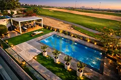 A stunning villa overlooking the golf course, featuring a super-modern design, 5 master bedrooms, 85