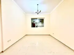 Luxury 2bhk with 3 washroom parking gym pool free with Separat hall front of al nahda park rent 50k