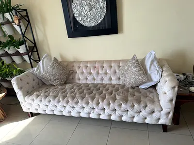 Elegant Beige Chesterfield Sofa with Cushions