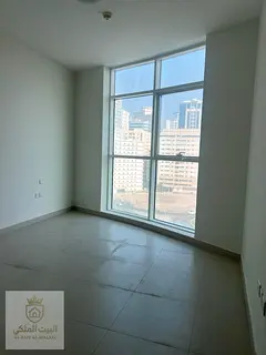 Two bedrooms and a living room in Al Taawun, directly on the Dubai exit. Master bedroom and