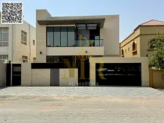 Luxury villa for sale in Al Rawda, 2 commercial units, 5 master bedrooms, majlis and 2 living rooms,