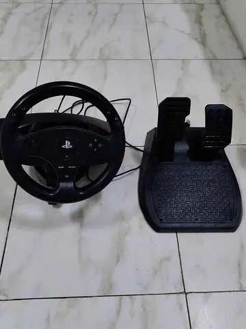 Sony PlayStation Racing Wheel with Pedals its use i lettel