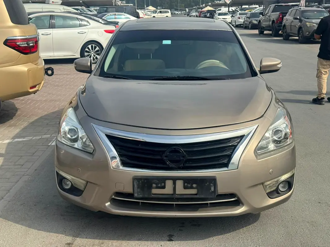 Nissan Altima 2014 — photo 1 of 11