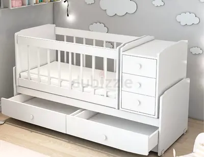 Stylish White Crib with Storage Drawers