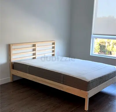 Minimalistic Wooden Bed Frame with Mattress