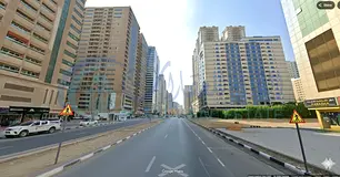 Residential &amp; Commercial Investment Land – Strategic Location on Two Main Roads, Al Nahda