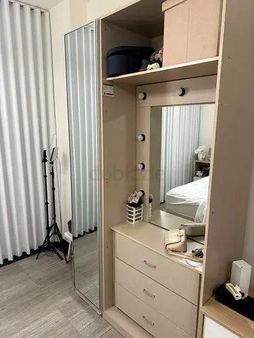 Elegant Wardrobe with Mirror and Storage Drawers