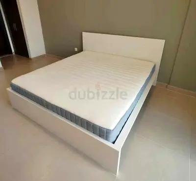 IKEA malam king‑size bed (180 × 200 cm) with an IKEA mattress