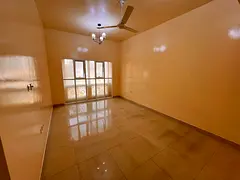A bedroom and a living room, two bathrooms, a separate hall, central air conditioning, spacious area