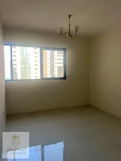 Spacious one-bedroom apartment with living room and balcony for rent in Al Taawun, located directly