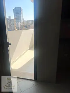 Two bedrooms, a living room, and a balcony in Al Taawun, right on the Dubai exit. Brand new building