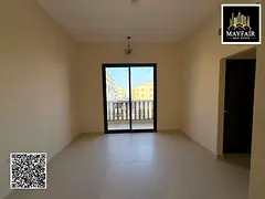 A spacious one-bedroom apartment with a balcony and a view in the Al-Aliya area, available for first