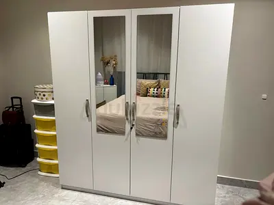 Modern Three-Door Wardrobe with Mirrors