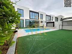 Villa for sale in Al Zorah area, Ajman, close to all services, overlooking the golf course directly,