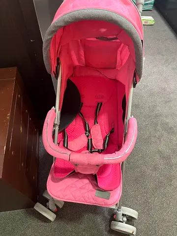 Pink Stroller with Adjustable Handle lock and winter and summer shade