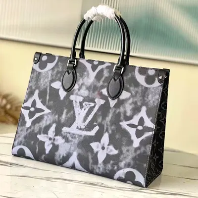 Louis Vuitton Onthego Tote Bag in Printed Monogram Coated Canvas And Reversed Monogram Canvas