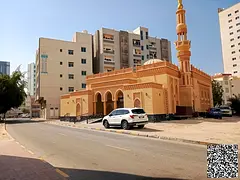 Corner commercial land opposite the mosque and close to Ajman Corniche Walk.