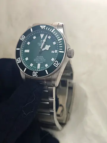 Men watch Tudor