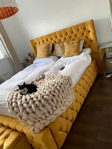 Cozy Mustard Yellow Bed with Chunky Knit Blanket